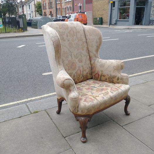 Antique wing back armchair