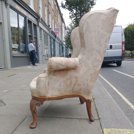 Antique wing back armchair