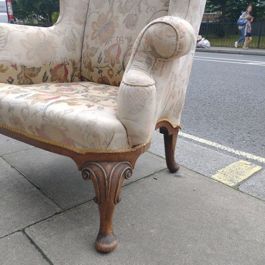 Antique wing back armchair