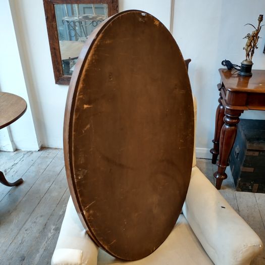 Antique parcel gilt and oak  oval mirror