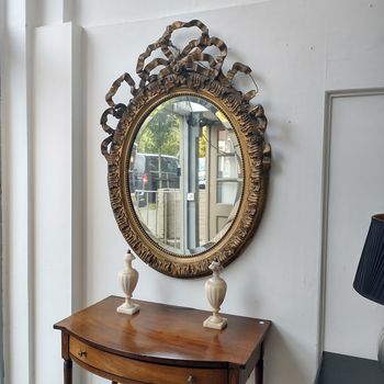 Antique early C19th oval mirror