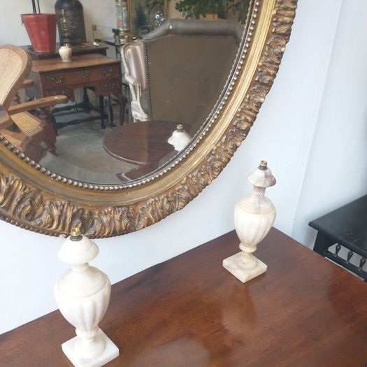 Antique early C19th oval mirror