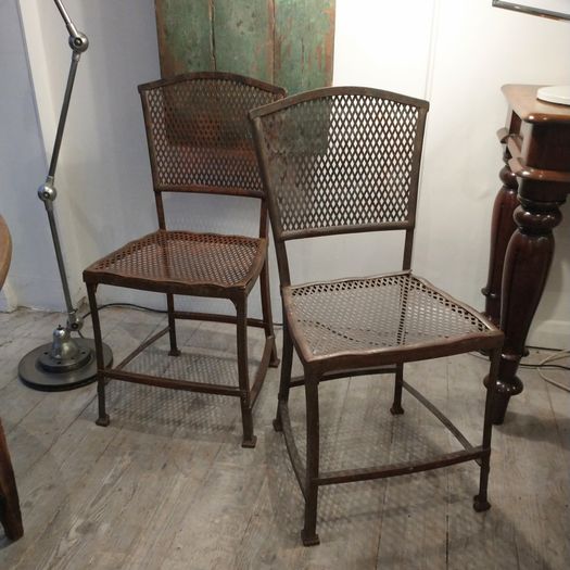 Pair of antique iron chairs