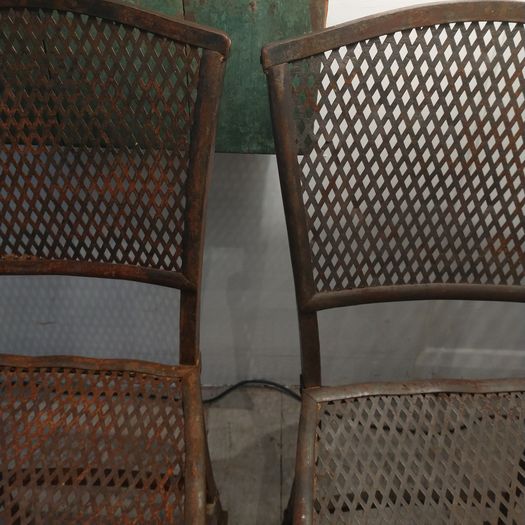 Pair of antique iron chairs
