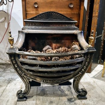 Polished iron fire grate
