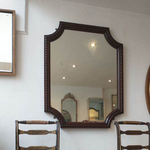 An unusual large antique mirror
