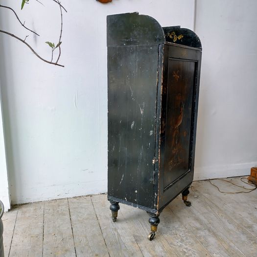 Antique black lacquer chinoiserie decorated cabinet