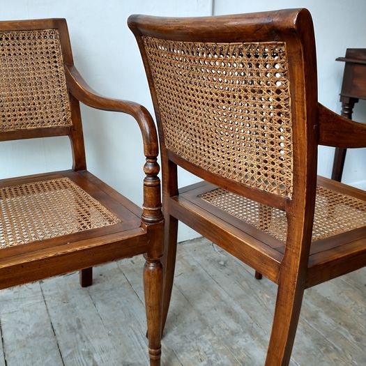 Pair Colonial teak armchairs