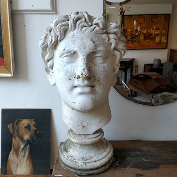 Large garden worn plaster head