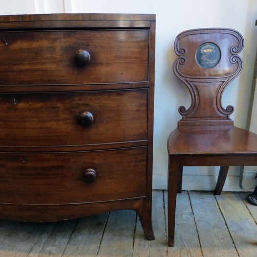 Early Regency bow fronted chest of drawers