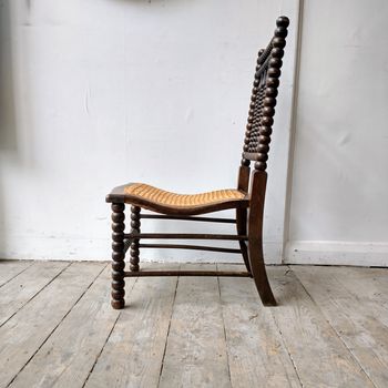 Antique bobbin slipper chair