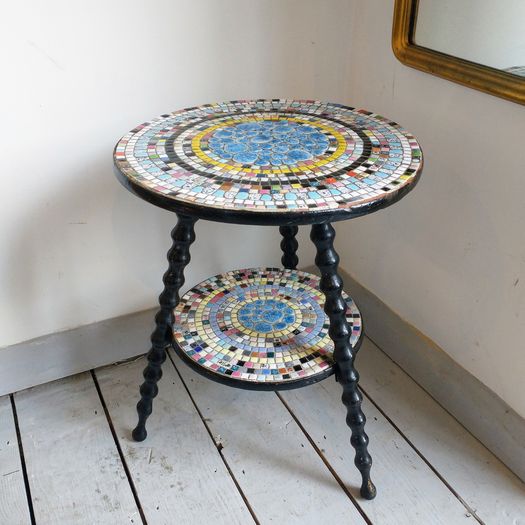 Antique bobbin table with tile decoration
