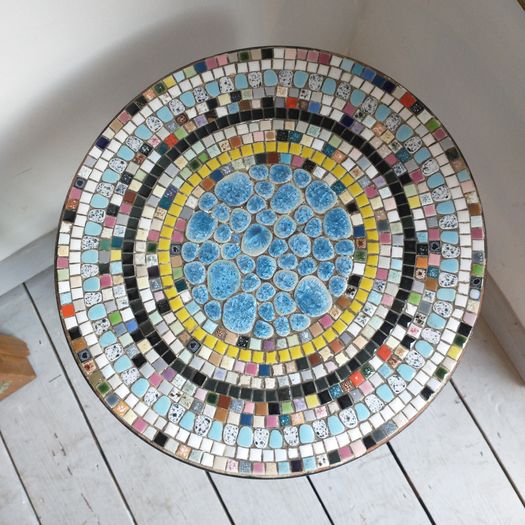 Antique bobbin table with tile decoration