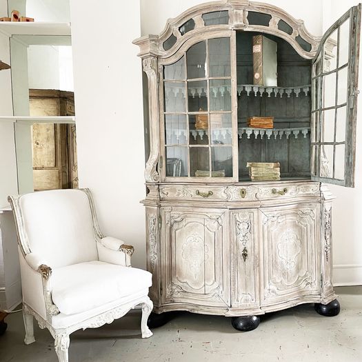 An 18th Century Limed Oak Serpentine Fronted Bruges Vitrine with Pale Blue Interior