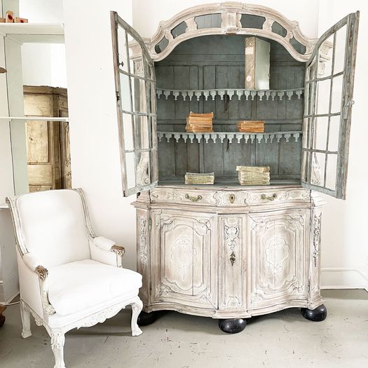 An 18th Century Limed Oak Serpentine Fronted Bruges Vitrine with Pale Blue Interior