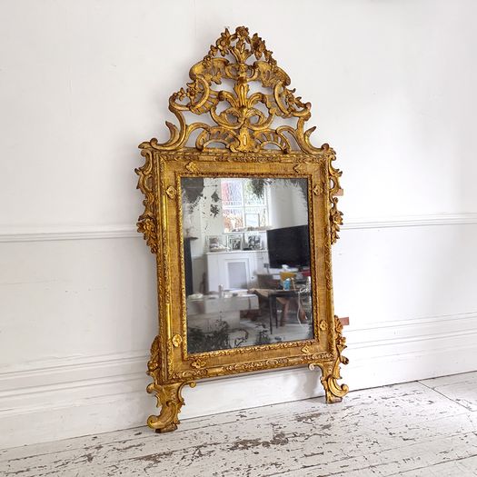 An 18th C Italian Piedmont Carved Giltwood Mirror