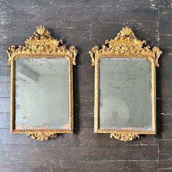 A Pair of Very Fine 18th Century Italian Giltwood Mirrors with Original Mercury Plates