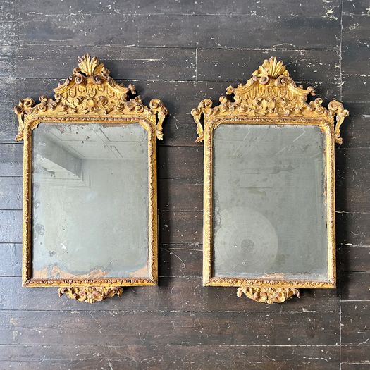 A Pair of Very Fine 18th Century Italian Giltwood Mirrors with Original Mercury Plates