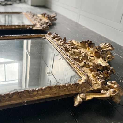 A Pair of Very Fine 18th Century Italian Giltwood Mirrors with Original Mercury Plates