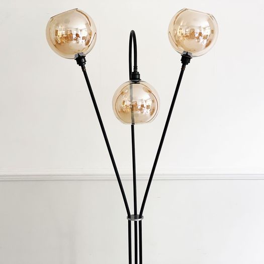 A Mid Century French Three Arm Black Metal Floor Light with Atomic Base