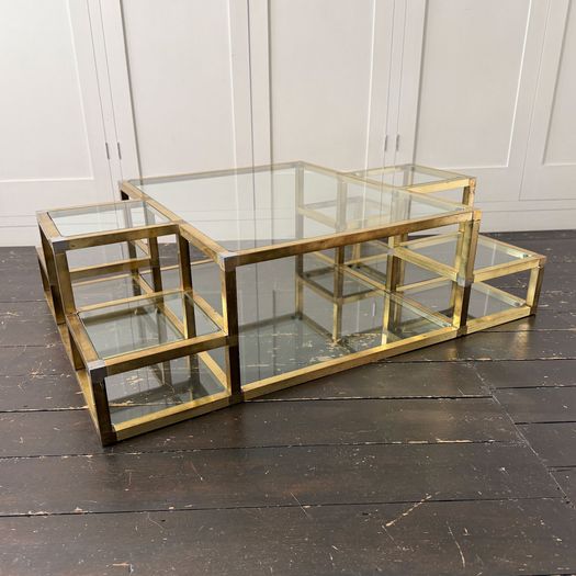A 1970's Italian Multi-Tiered Brass & Glass Coffee Table