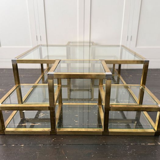 A 1970's Italian Multi-Tiered Brass & Glass Coffee Table