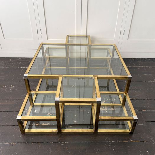 A 1970's Italian Multi-Tiered Brass & Glass Coffee Table