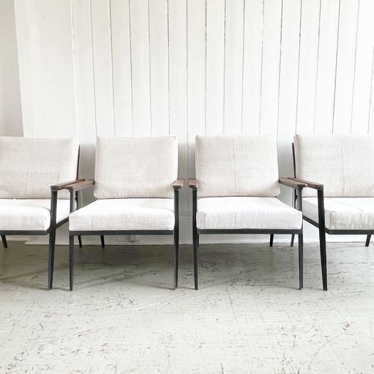 Two Pairs of 1970's American Black Metal Armchairs