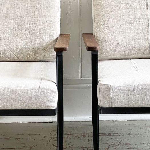 Two Pairs of 1970's American Black Metal Armchairs