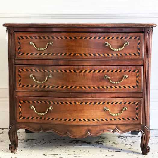 An Early 19th C French Serpentine Fronted Cherry Wood Commode