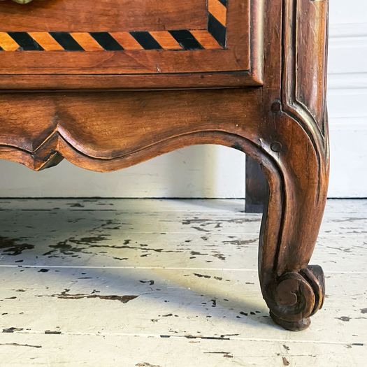 An Early 19th C French Serpentine Fronted Cherry Wood Commode