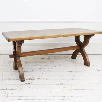 An Antique French Oak Cross Leg Sawbuck Trestle Dining Table