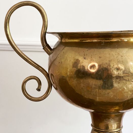 A Large 19th Century Brass Urn with Scrolled Handles and Claw Feet