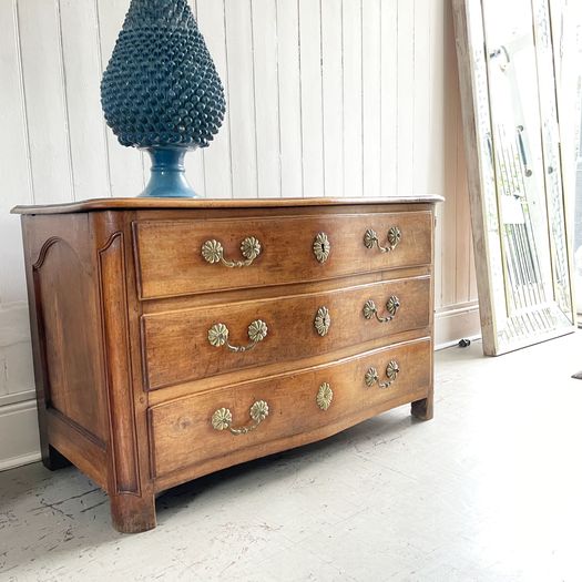 A Louis XV Walnut Serpentine Fronted Commode