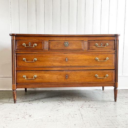 A Louis XVI Walnut Commode with Original Brass Handles