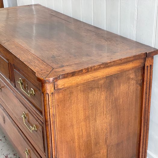 A Louis XVI Walnut Commode with Original Brass Handles