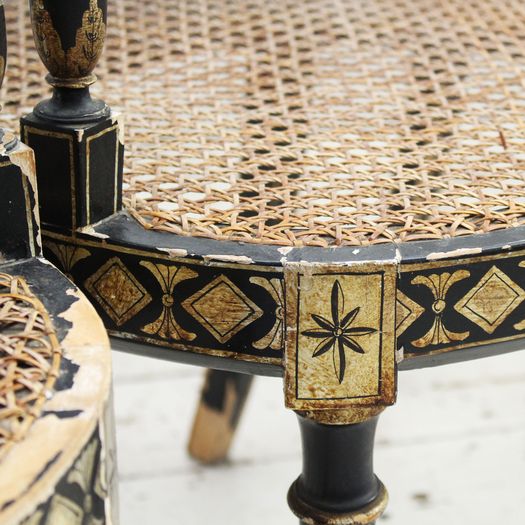 Two Pairs of Black Hepplewhite Caned Armchairs