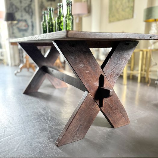 A Late 19th Century French Pine Sawbuck Trestle Table