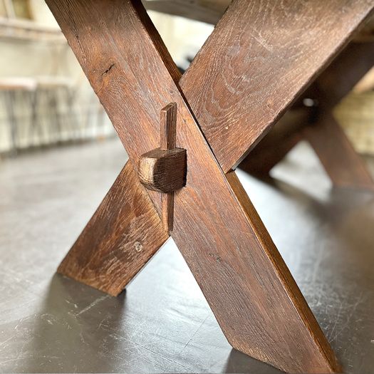 A Late 19th Century French Pine Sawbuck Trestle Table