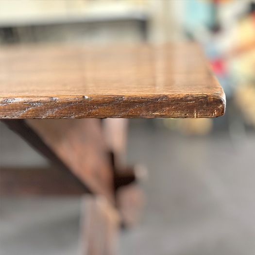 A Late 19th Century French Pine Sawbuck Trestle Table