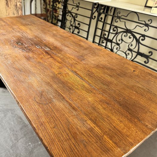 A Late 19th Century French Pine Sawbuck Trestle Table