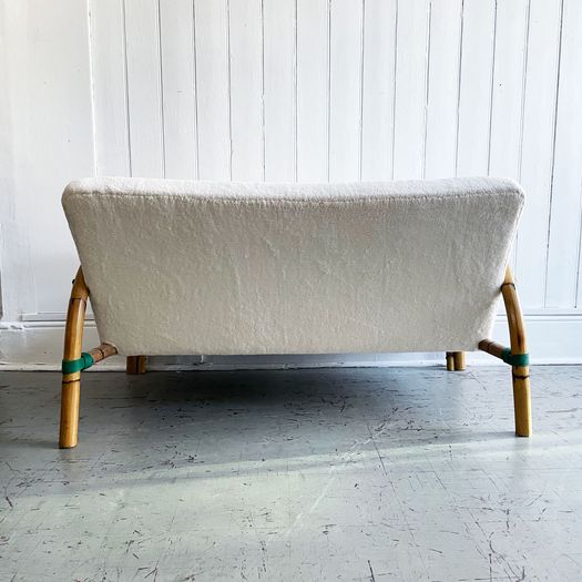 A 1950's French Bamboo Sofa with Soft Sheepskin Upholstery