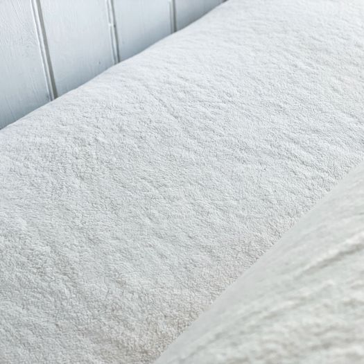 A 1950's French Bamboo Sofa with Soft Sheepskin Upholstery