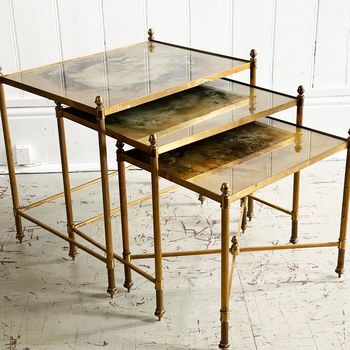 A Set of 1950's French Gold Eglomisé Glass & Brass Side Tables