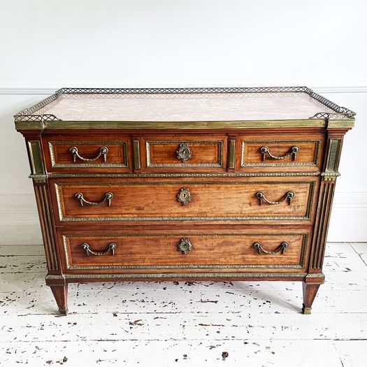 A Majestic Louis XVI Mahogany and Brass Commode