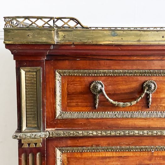 A Majestic Louis XVI Mahogany and Brass Commode