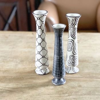 Three Monochrome African Soapstone Bud Vases