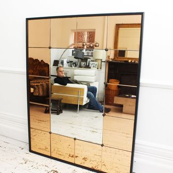 A Large Mid Century French Mirror with Amber Mirror and Ebonised Surround