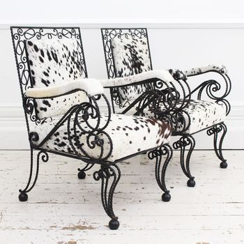 A Pair of 1950's French Cowhide Wrought Iron Armchairs