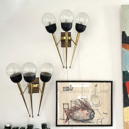A Large Pair of Mid Century Brass Torch Wall Lights